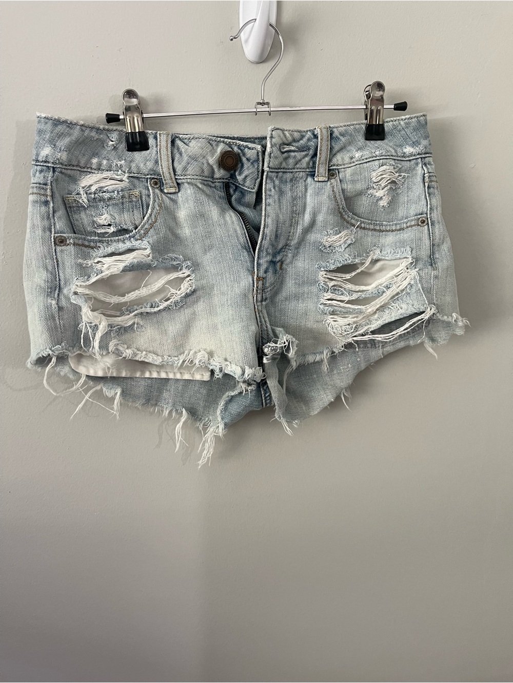 Distressed Light Wash Denim Shorts - Women